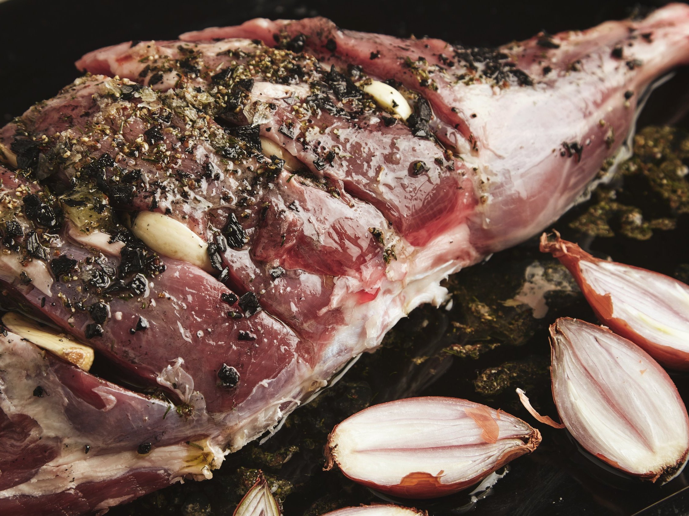 close-up-detail-pre-cooked-icelandic-lamb-leg-meat-wit-spices-herbs.jpg